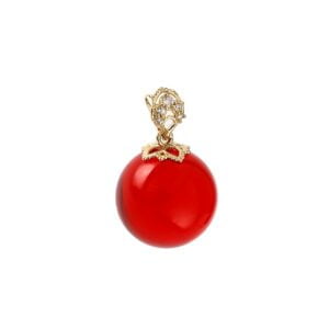 Gold amber pendant in the shape of a ball in a beautiful cherry color, with zircons